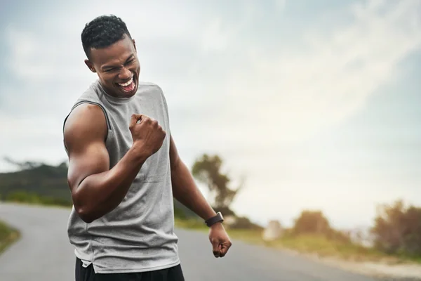 Man celebrating sustained progress